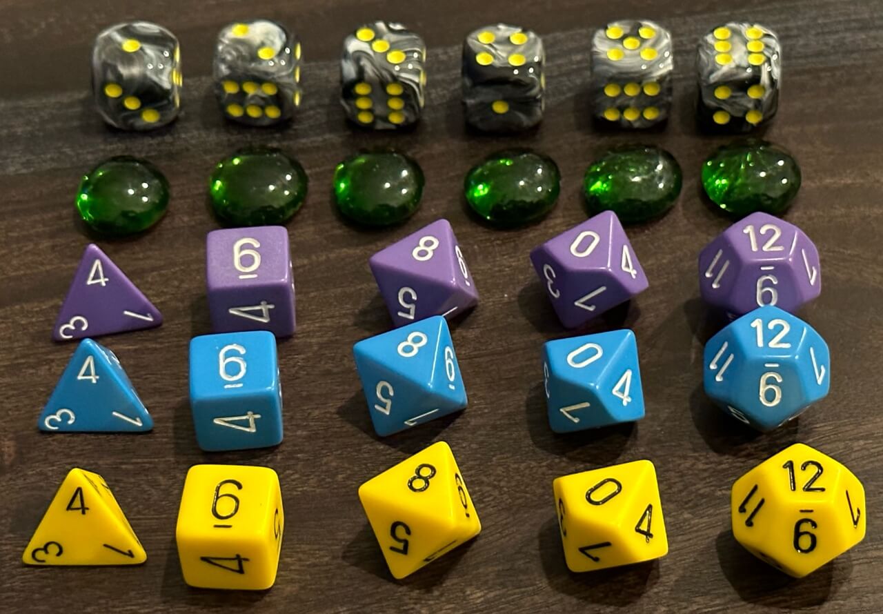 Polyhedral dice and tokens used for playing tabletop RPGs.